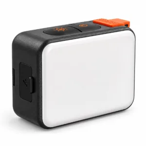 Luz LED magnética TELESIN negra con difusor blanco y seguros naranjas, vista de frente en tres cuartos.